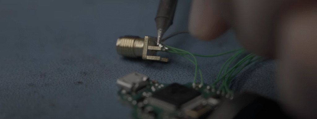 Joe Grand physically hacking a Trezor Model T